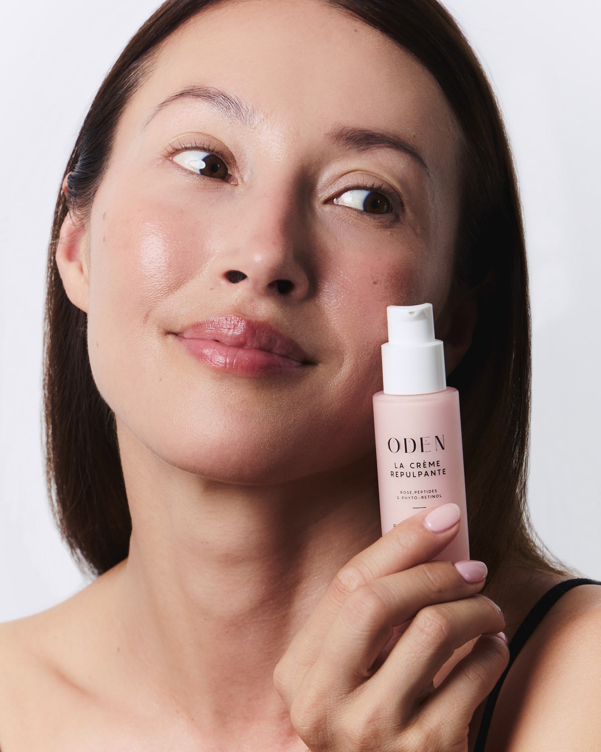 Modèle présentant La Crème Repulpante Oden